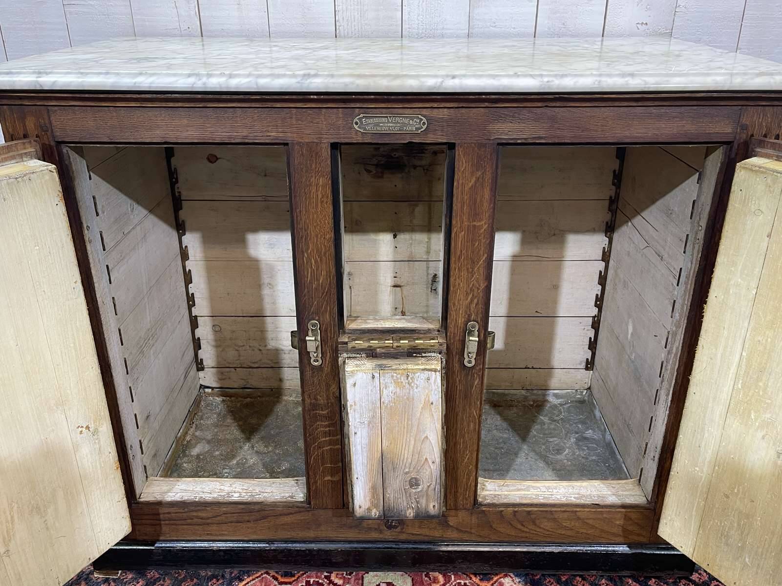 Glacière début XXème en chêne et dessus marbre