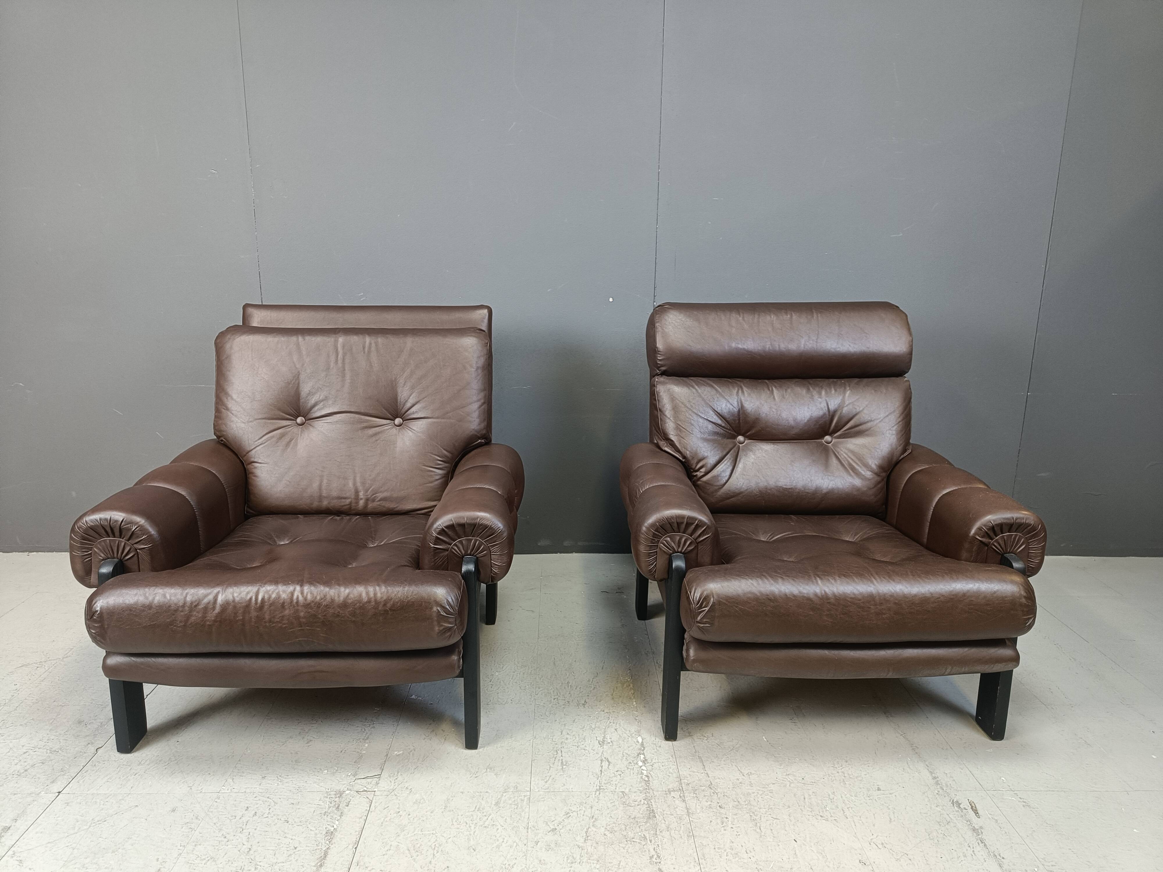 Pair of leather armchairs made in Denmark, 1960s