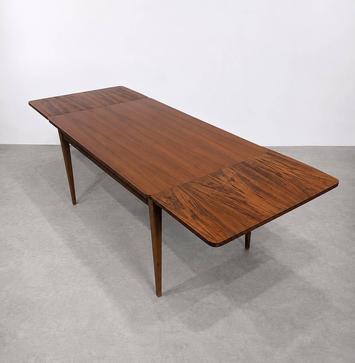 Scandinavian extendable dining table in teak, circa 1960.