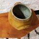 Old yellow glazed terracotta pot