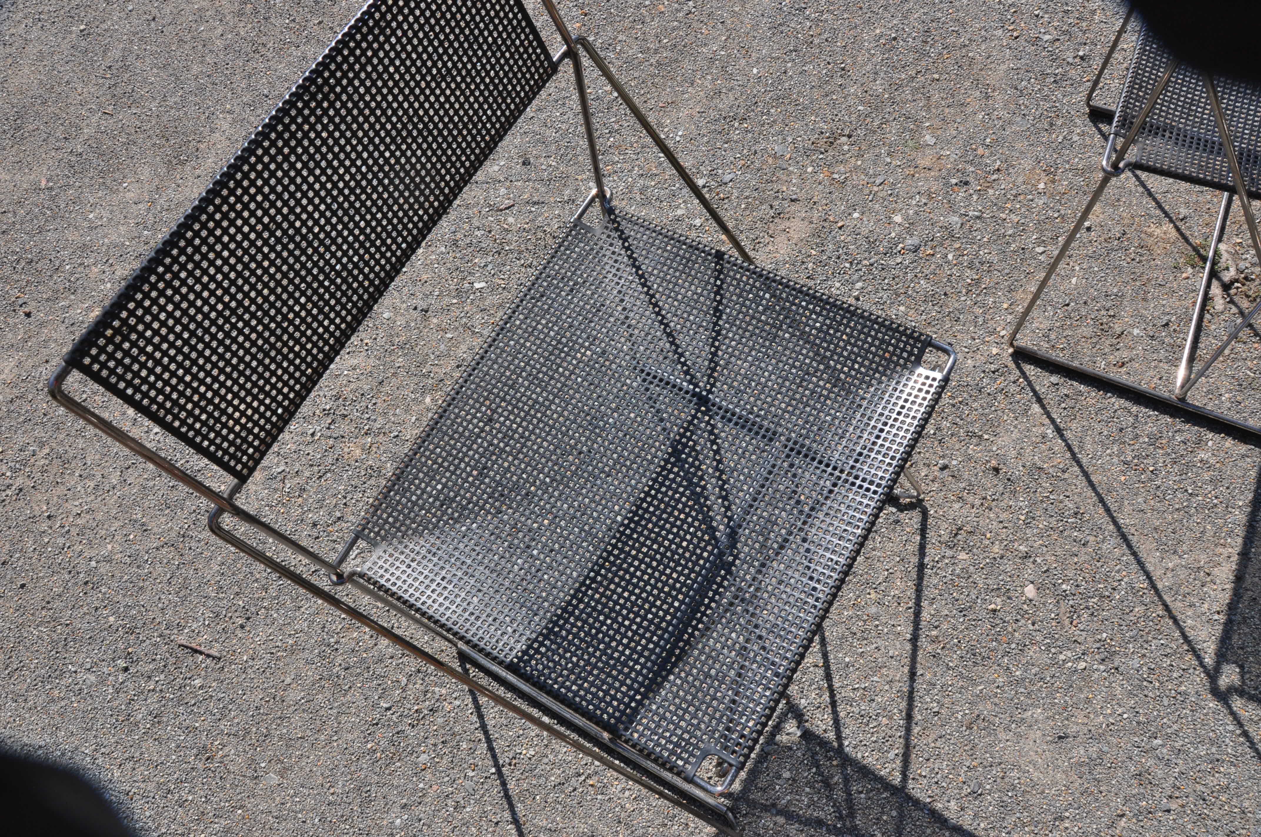 Nuova x line omli chairs by Niels Jørgen Haugesen