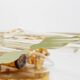 1980s wall lamp in gilded brass and crystal glass by Novaresi Milano