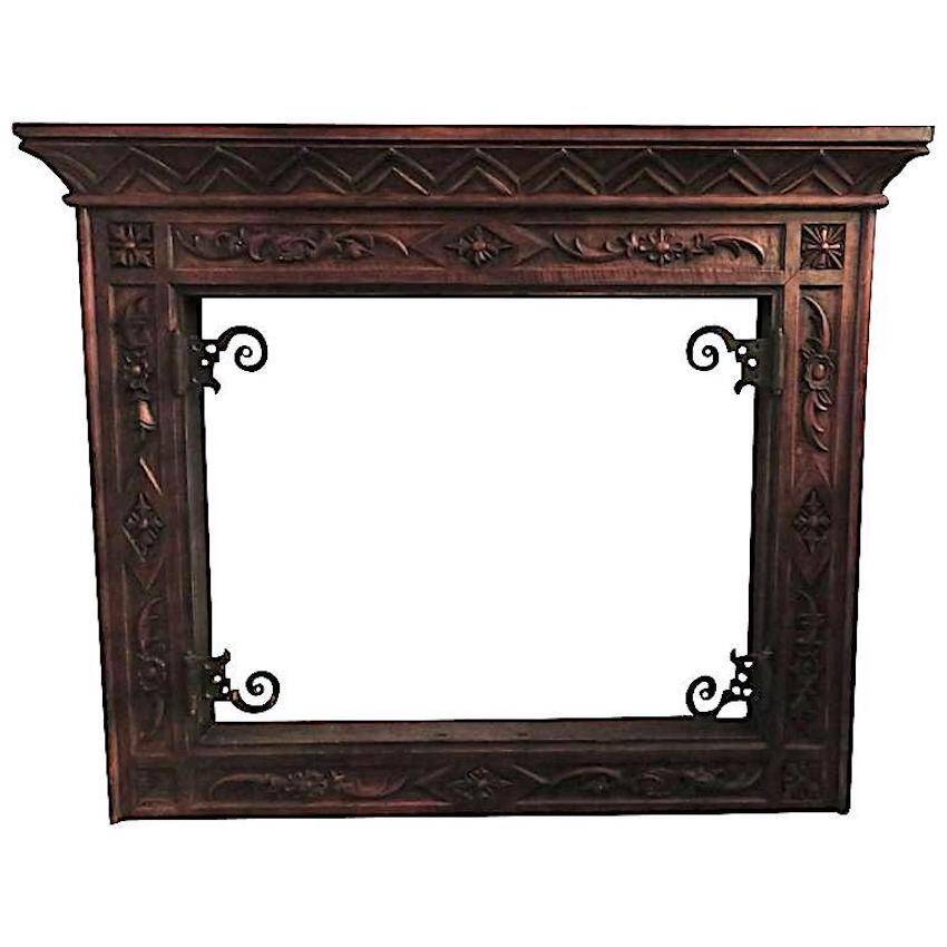 Art deco fireplace in carved solid teak and wrought iron, 1920