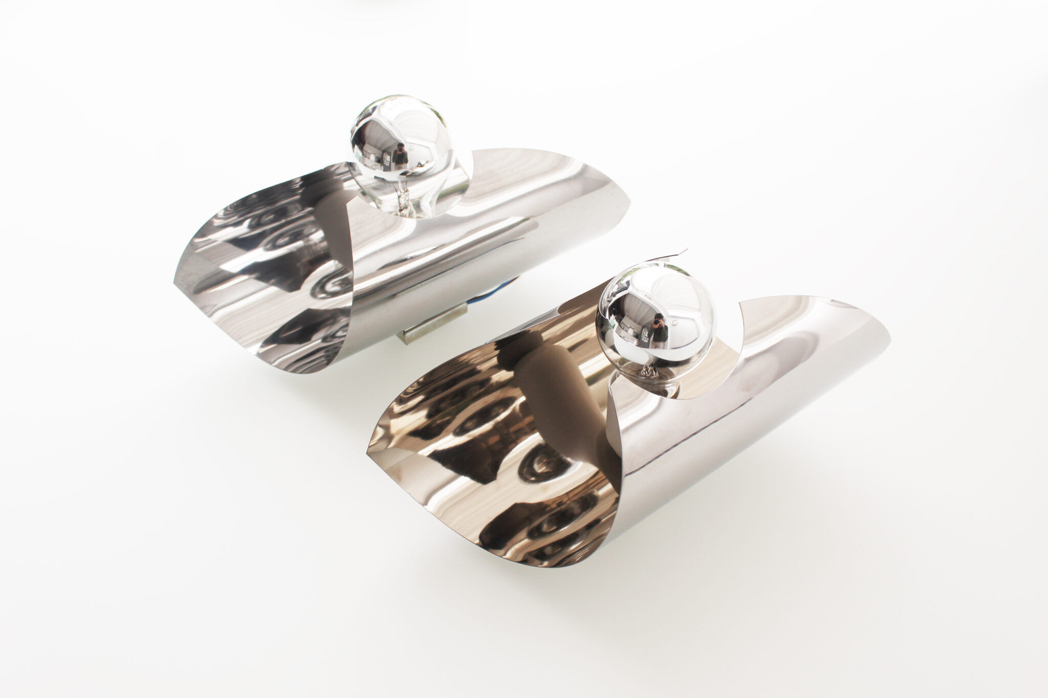 Vintage pair of 1970's chrome space age wall lights
