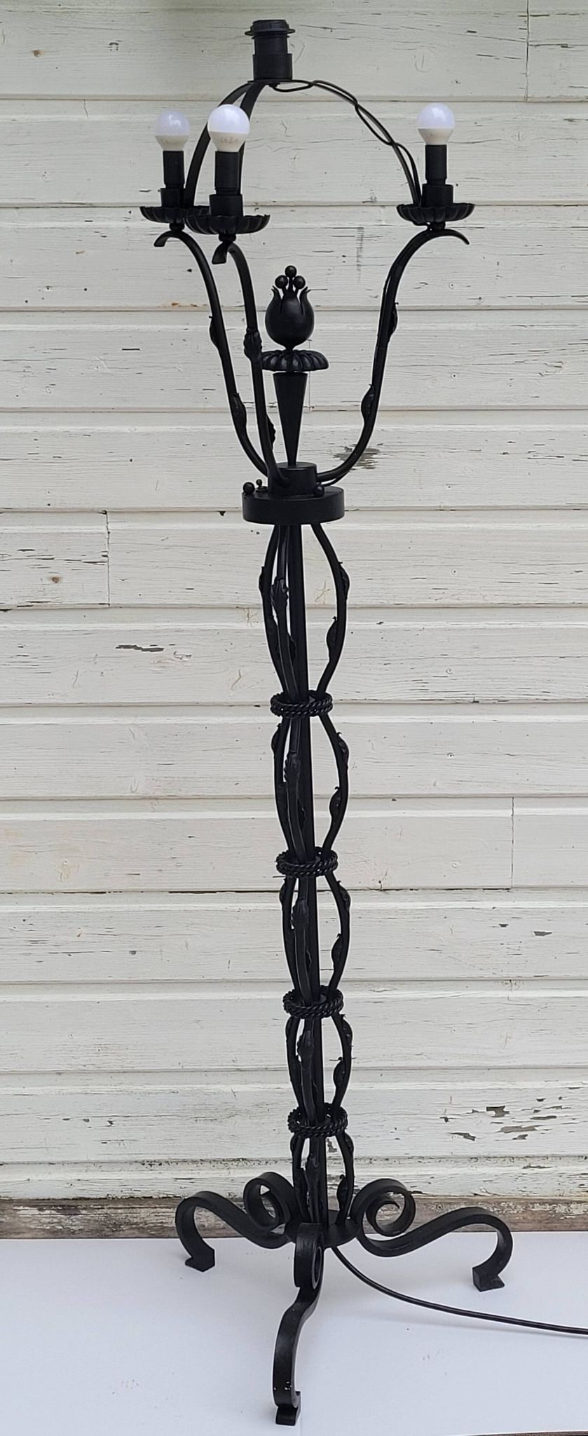 Black wrought iron floor lamp attributed to Gilbert Poillerat