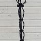 Black wrought iron floor lamp attributed to Gilbert Poillerat