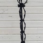 Black wrought iron floor lamp attributed to Gilbert Poillerat