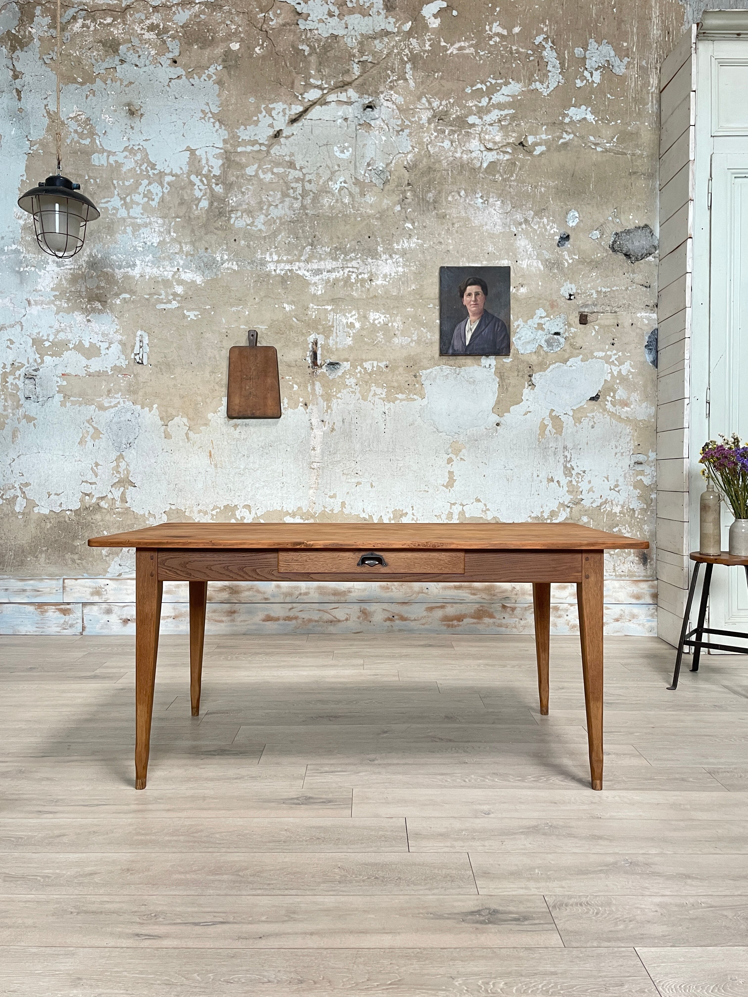 Vintage farmhouse table with spindle legs.