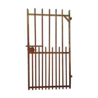 Old riveted metal gate