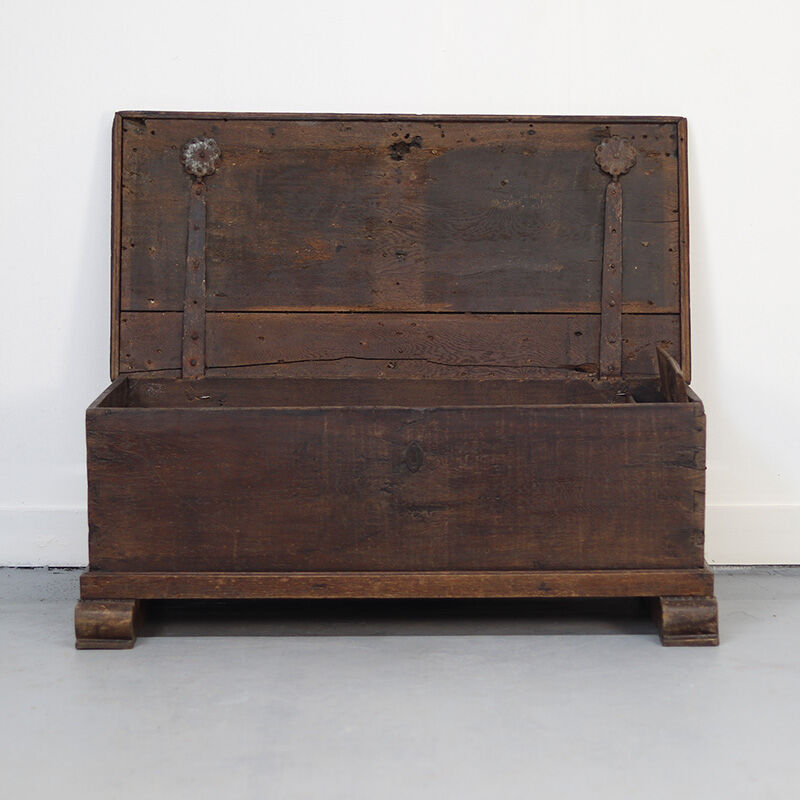 Rustic and weathered antique oak chest from the 18th century.