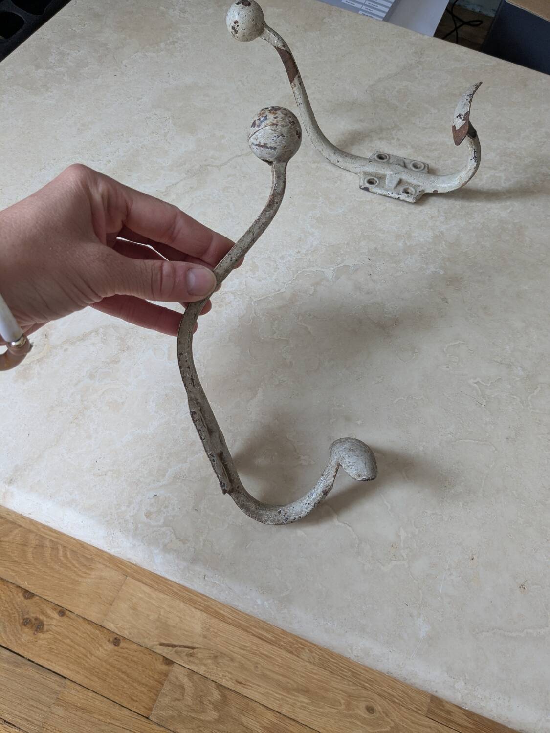 Two vintage coat hooks