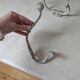 Two vintage coat hooks