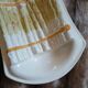 Old plate in slipware/asparagus