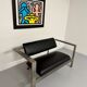Brutalist living room with faux metal armchairs designed by Karl Friedrich Forster