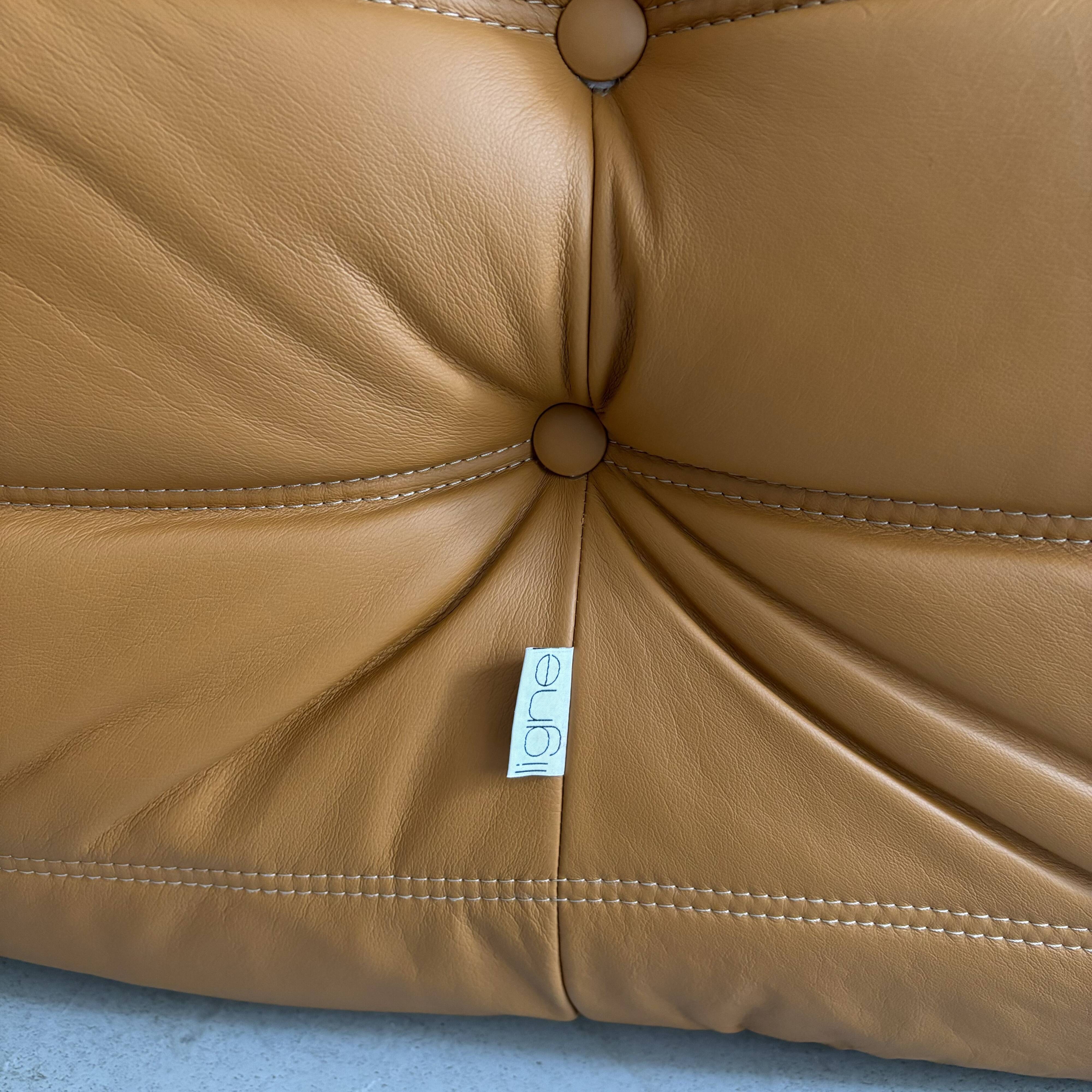 Chauffeuse " togo"  en cuir marron par Michel Ducaroy