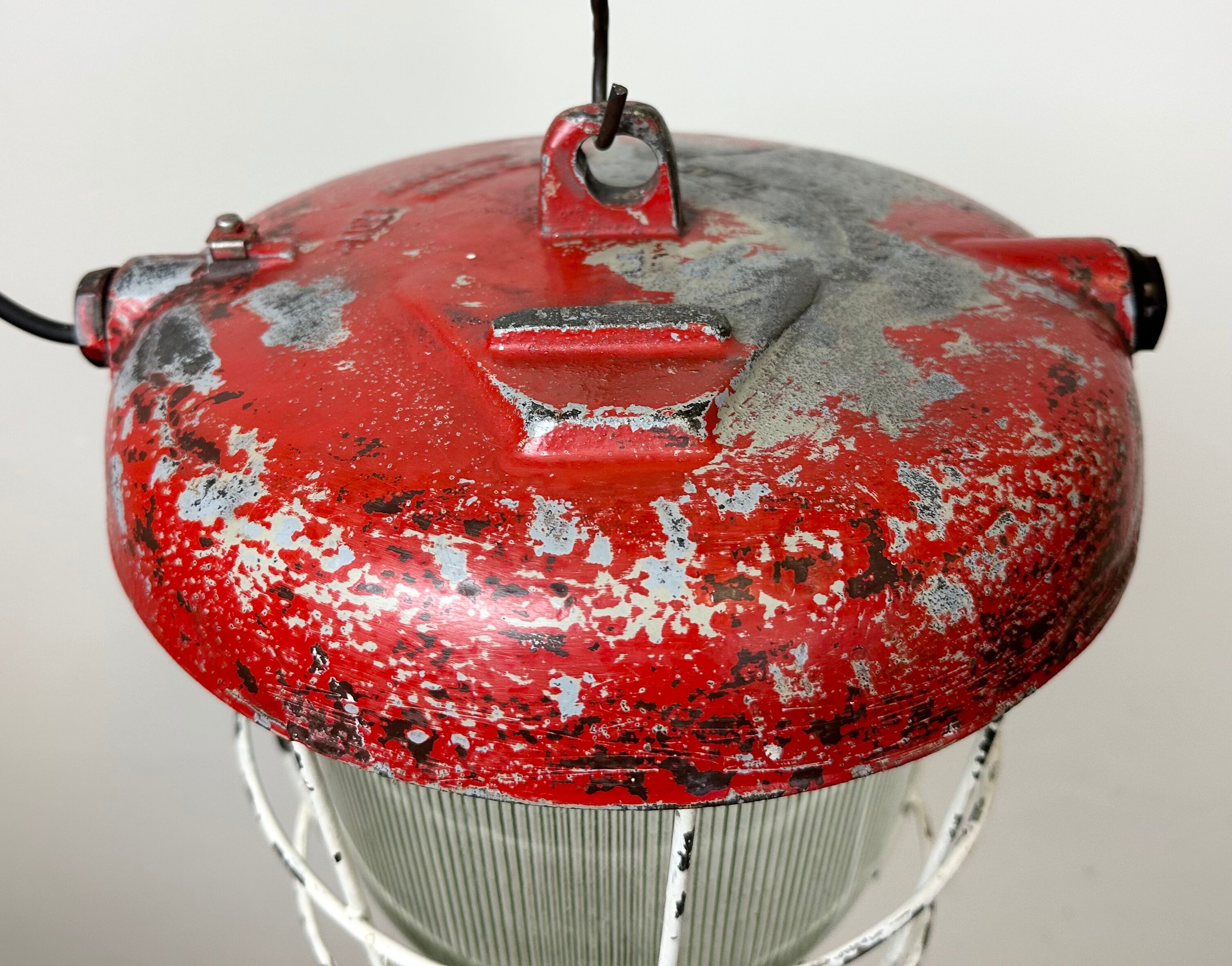 Red industrial cast iron cage pendant light, 1960s