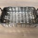 Woven silver-plated metal basket.