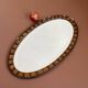 Miroir oval ancien biseauté