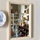 Beige wooden mirror