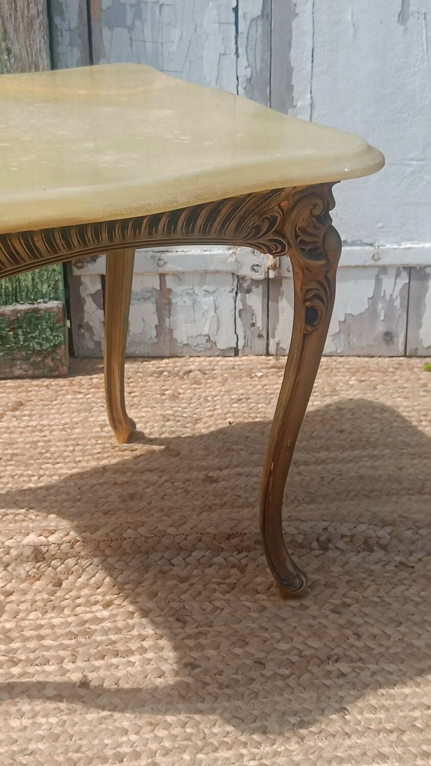 Vintage side table in gilded brass with an onyx top.