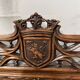 Pair of Gothic-style walnut lounge chairs, 19th century