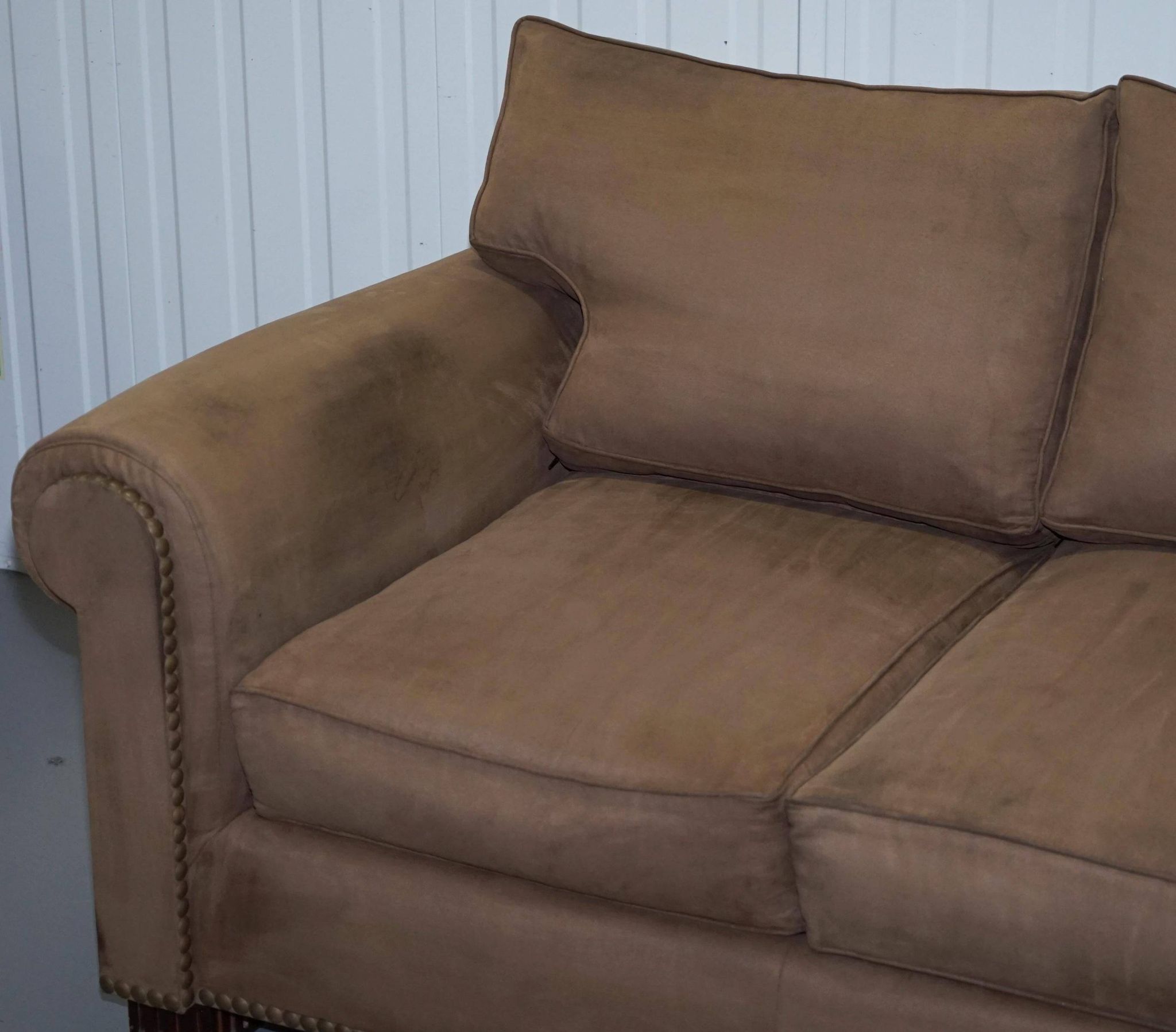 Ralph Lauren Jamaica velvet sofa pair with feather cushions.