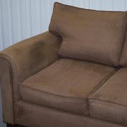 Ralph Lauren Jamaica velvet sofa pair with feather cushions.