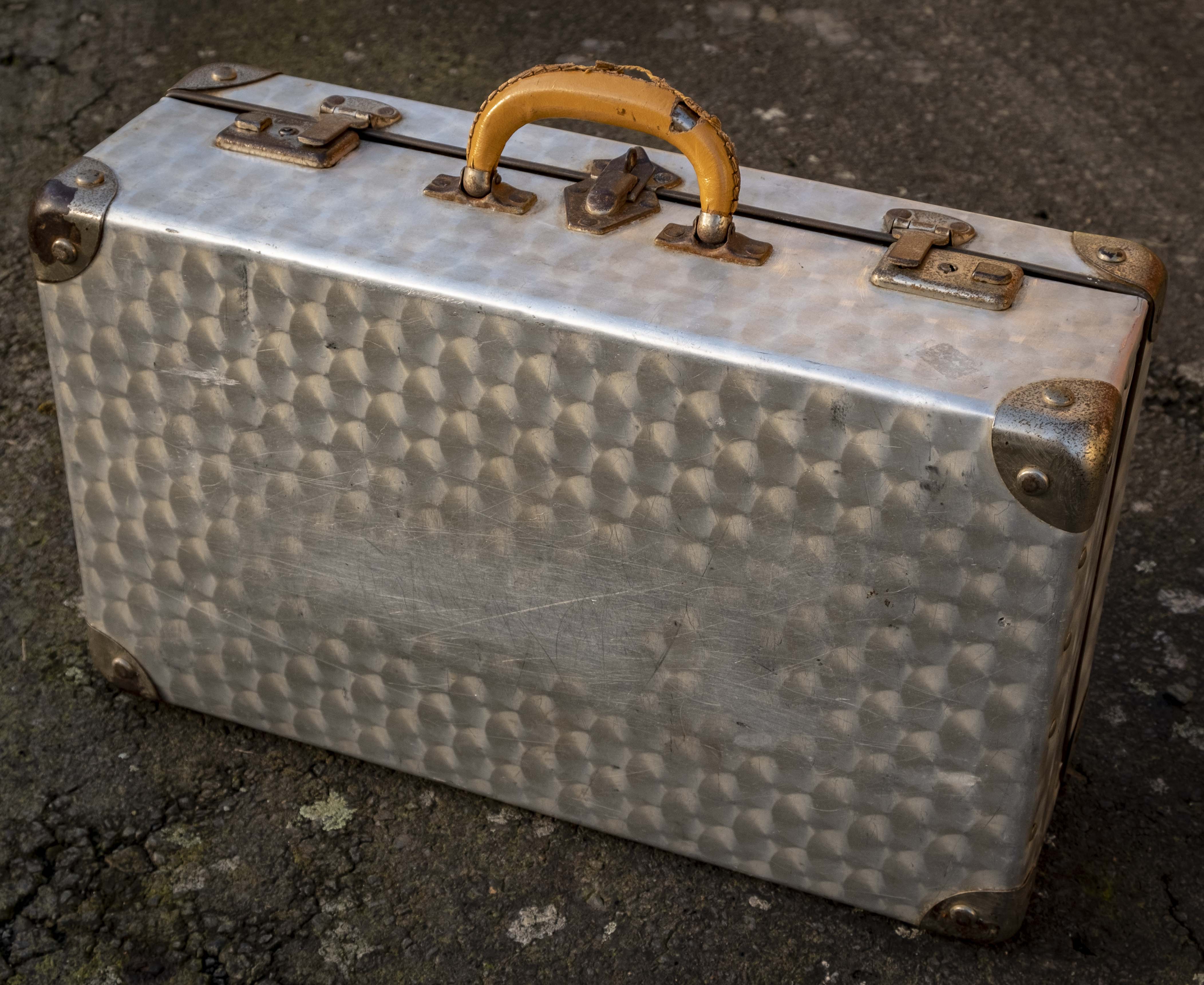 Metallic suitcase