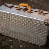 Metallic suitcase