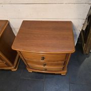 Pair of Louis Philippe style bedside tables in cherry wood.
