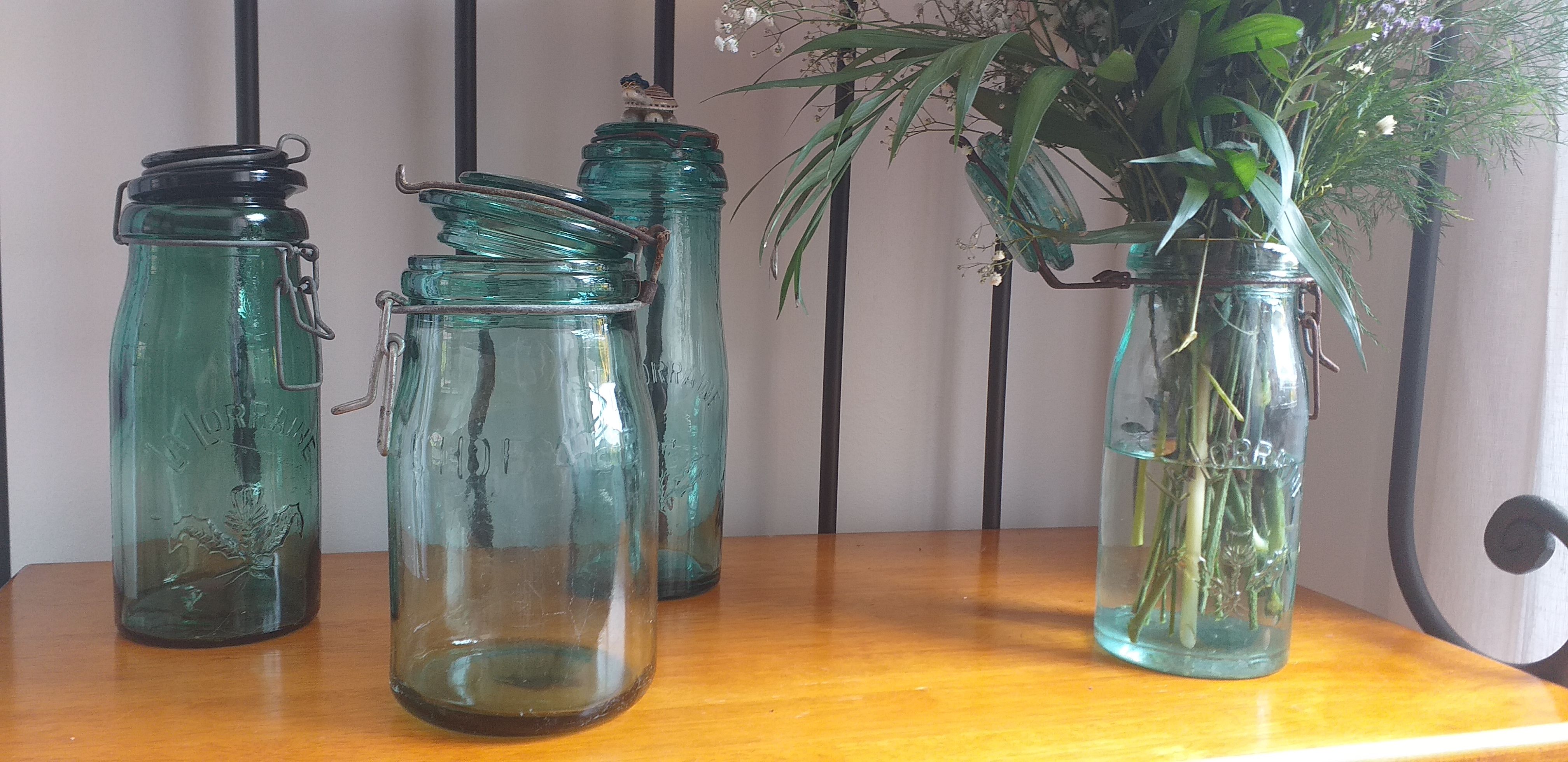 Old jar La Lorraine and The ideal in thick glass light green and dark green
