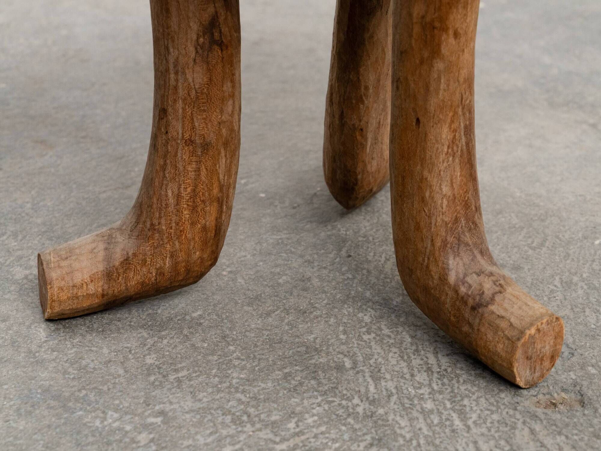 Ancient primitive monoxyle tripod stool from Ethiopia, Wanza wood.