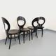 Set of 4 vintage Mouette chairs by Baumann in black wood from the 1960s.