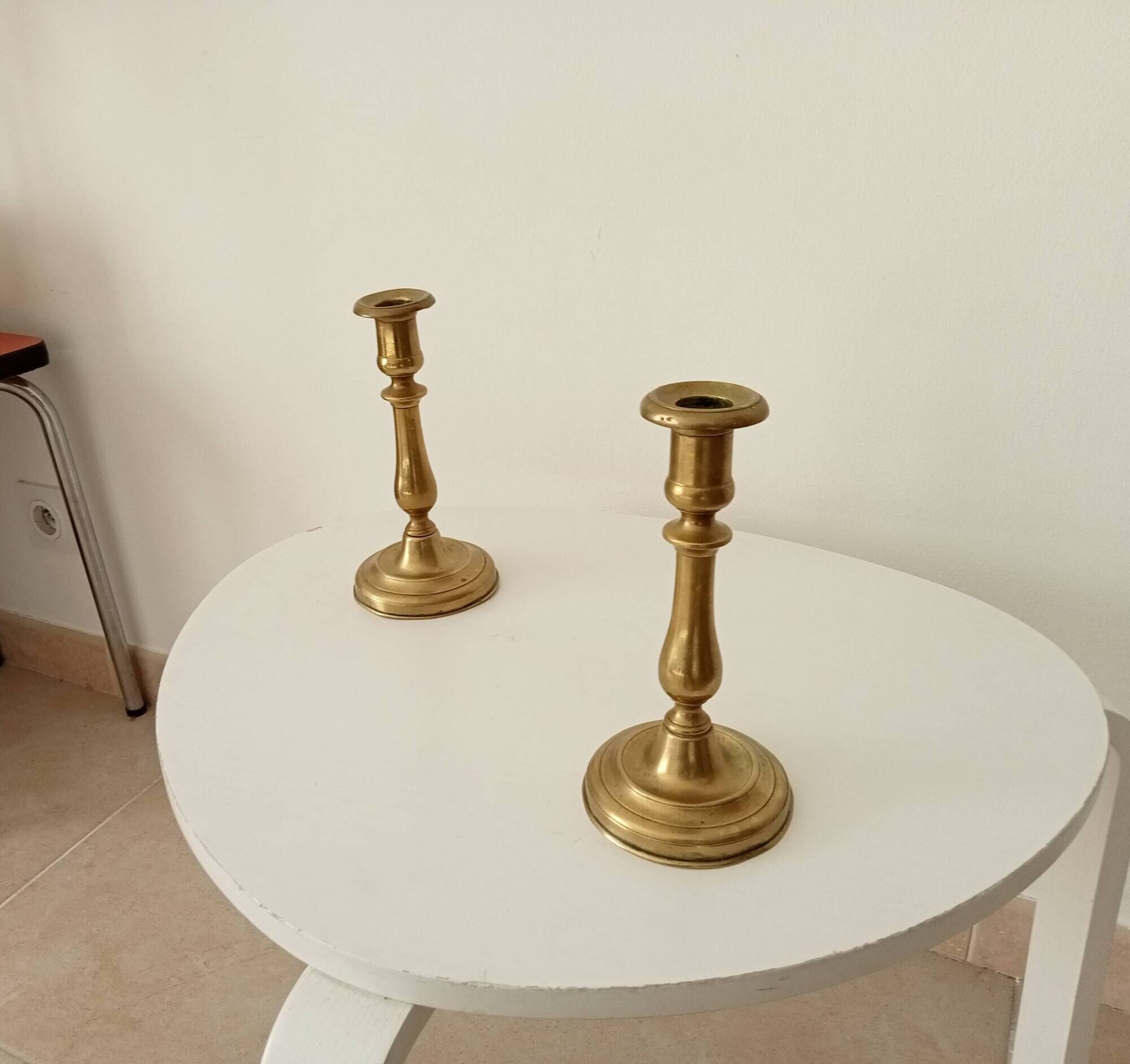 Pair of old candlesticks in solid gilded brass