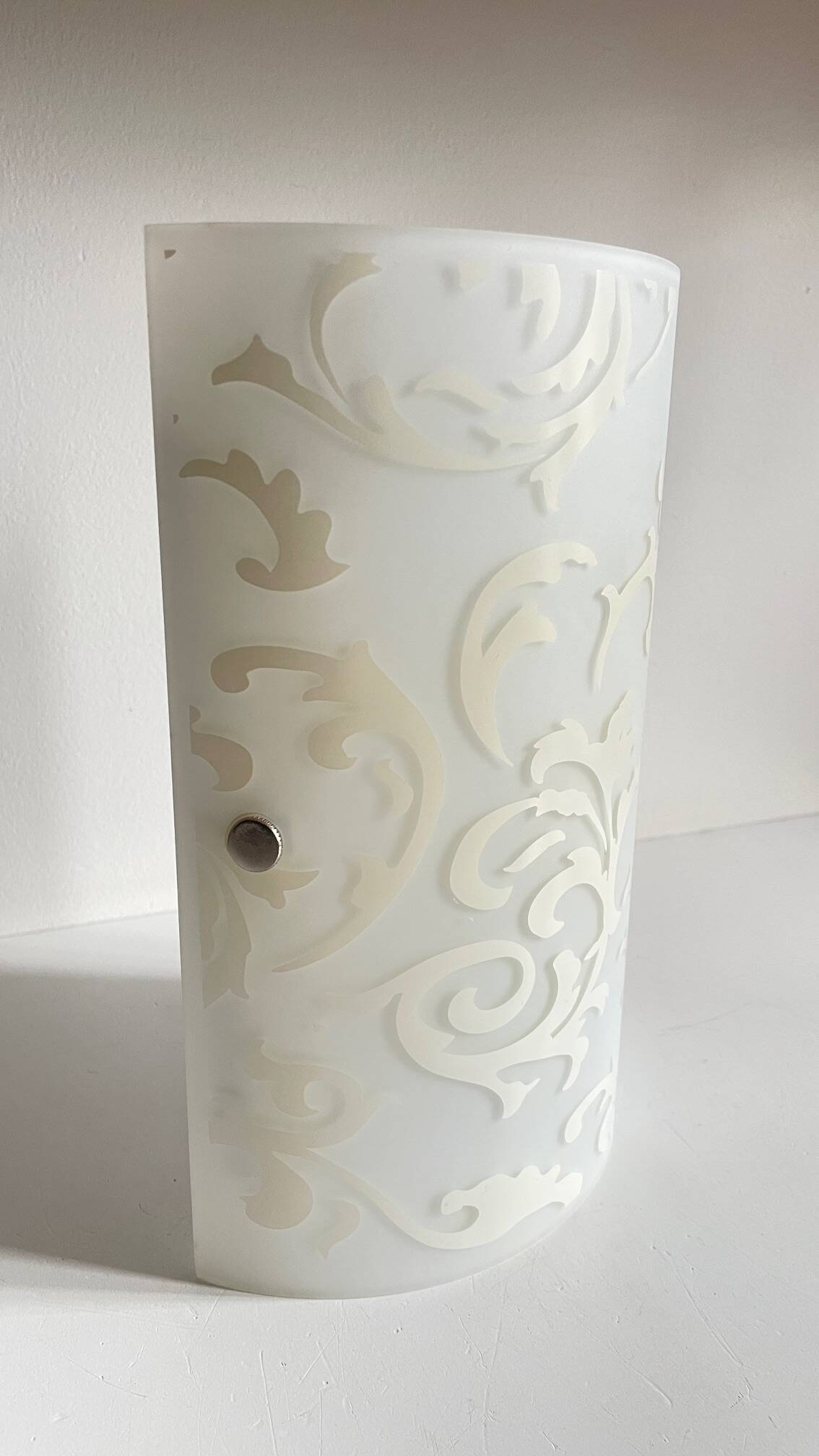 Polished and screen-printed glass sconce by eglo