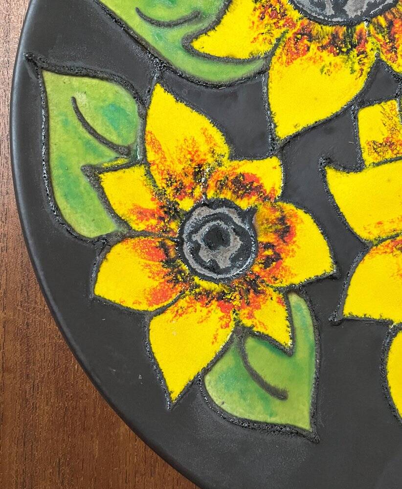 Mid-century German studio pottery wall plate with Ruscha sunflower motif, 1960s.