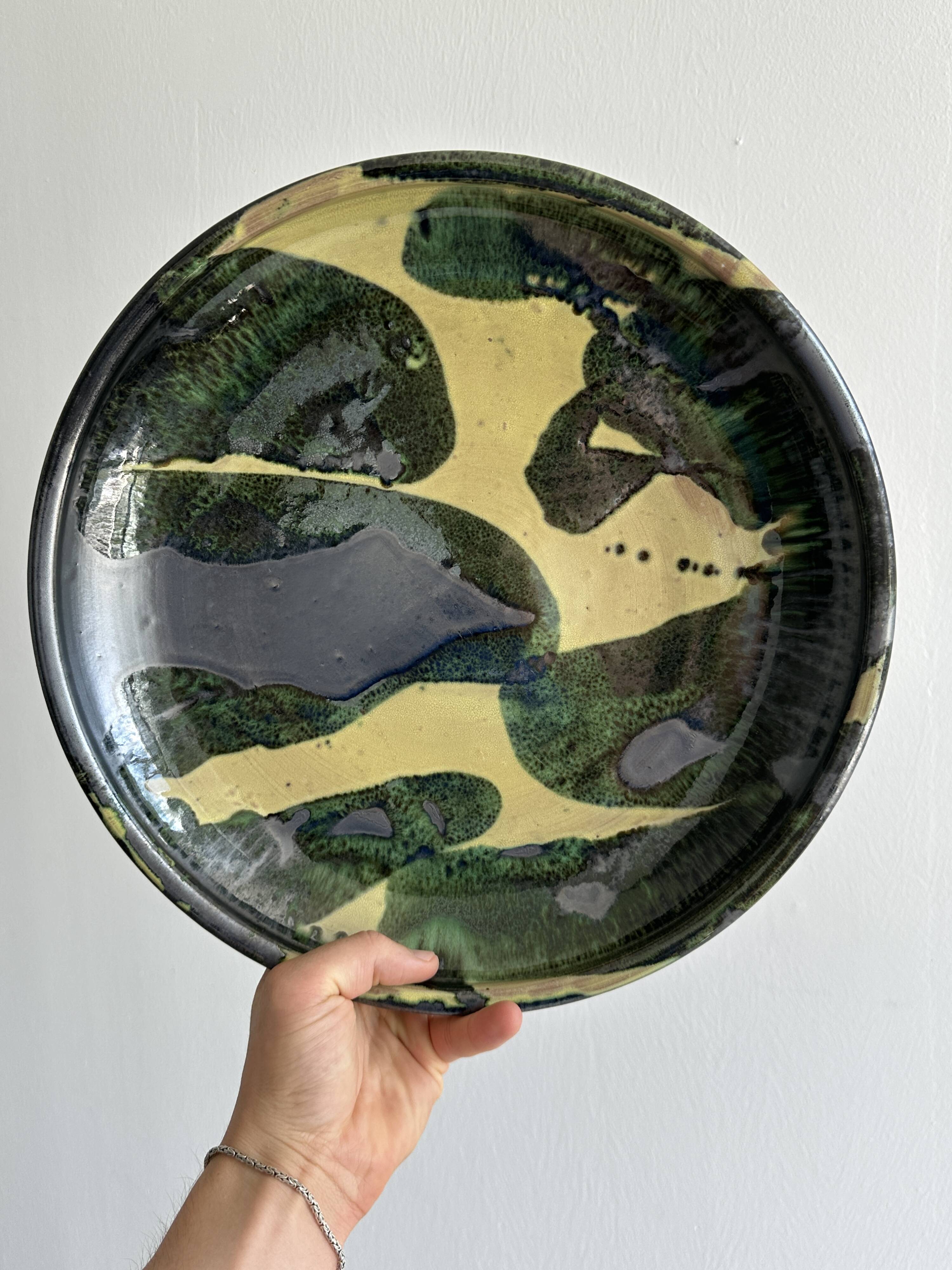 large colored terracotta ceramic dish