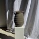 Large oval vase with double handles, featuring raised grey-beige stripes, H42 D28.
