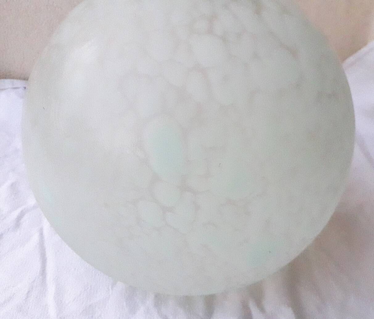 Glass ball suspension