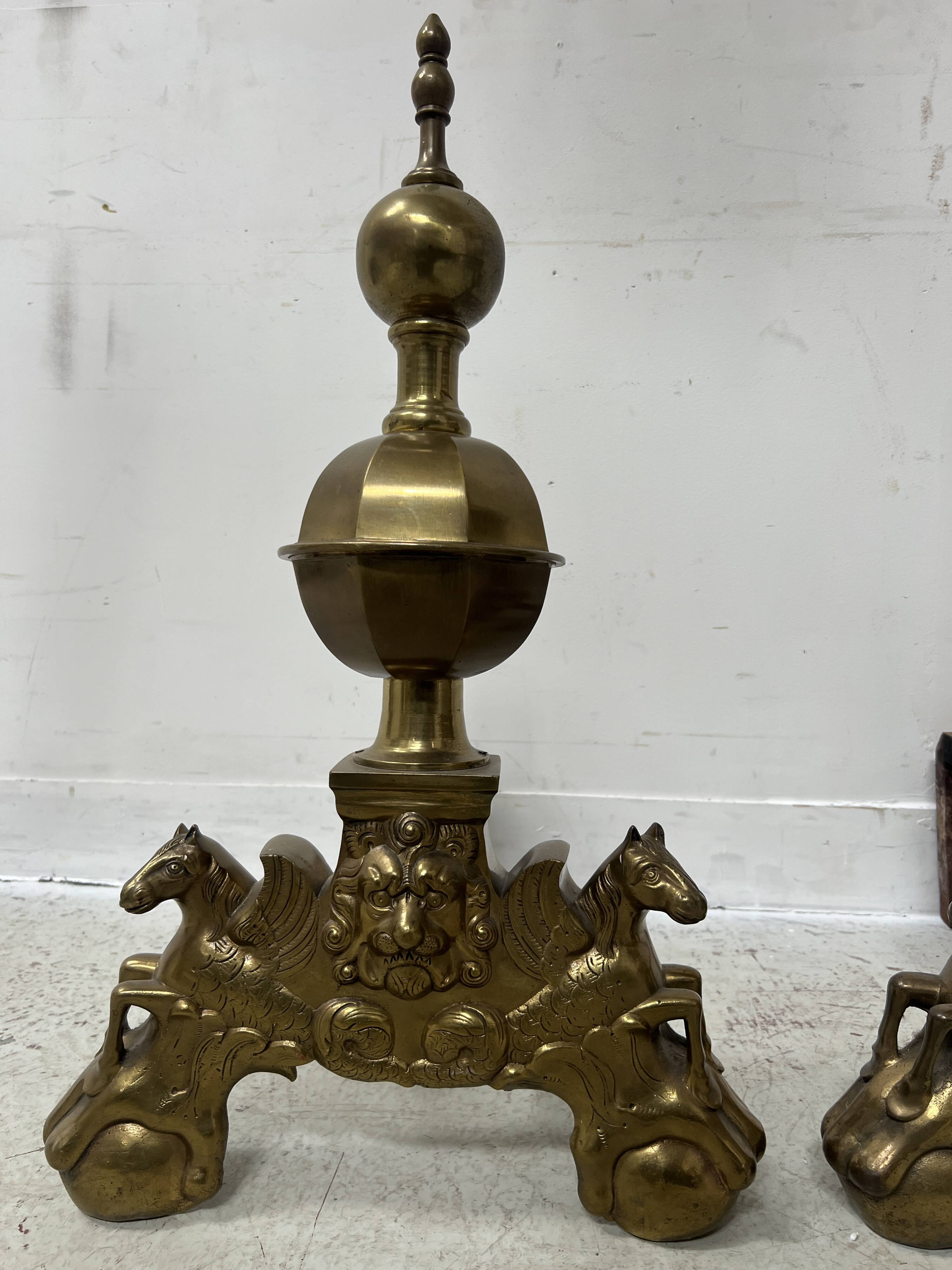 Important pair of brass log holders from the 20th century.