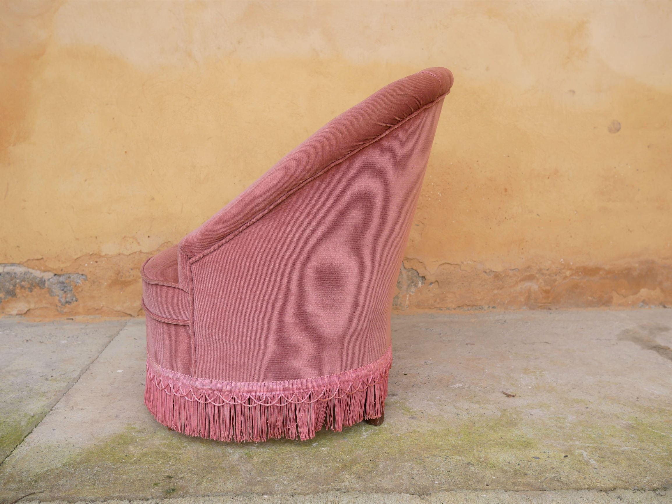 Old pink vintage padded "toad" chair