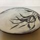 Large signed ceramic catchall.