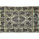 Romanian floral rug handwoven in wool, yellow and black background