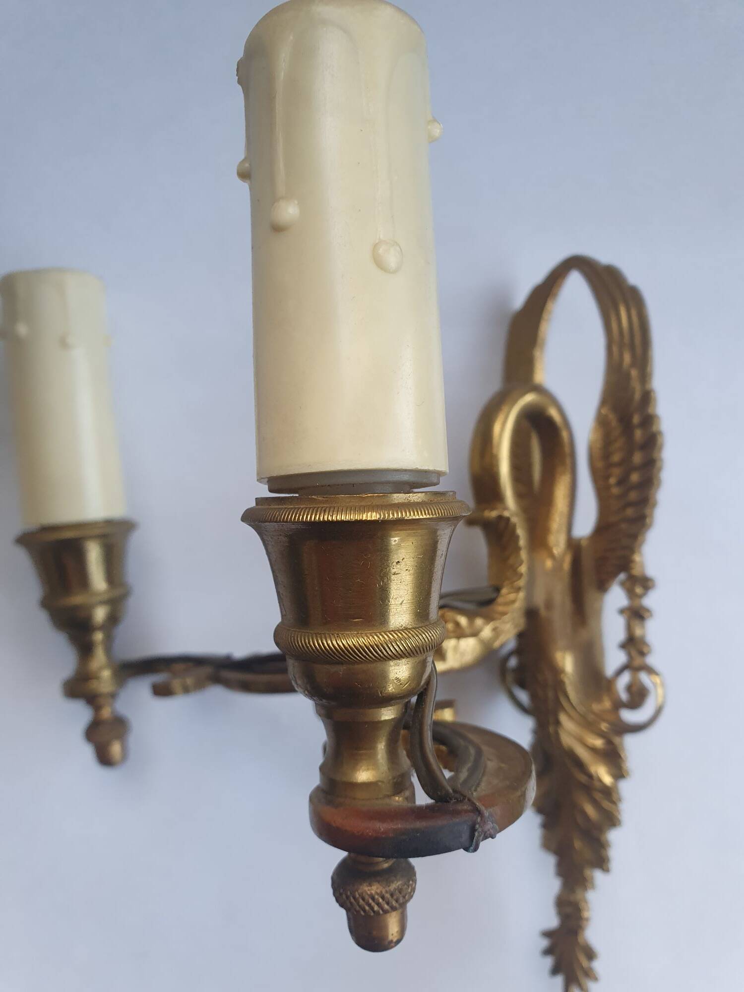 Pair of wall sconces candle holders in Empire style in bronze