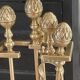 Brass fireplace tools in the style of Maison Baguès.