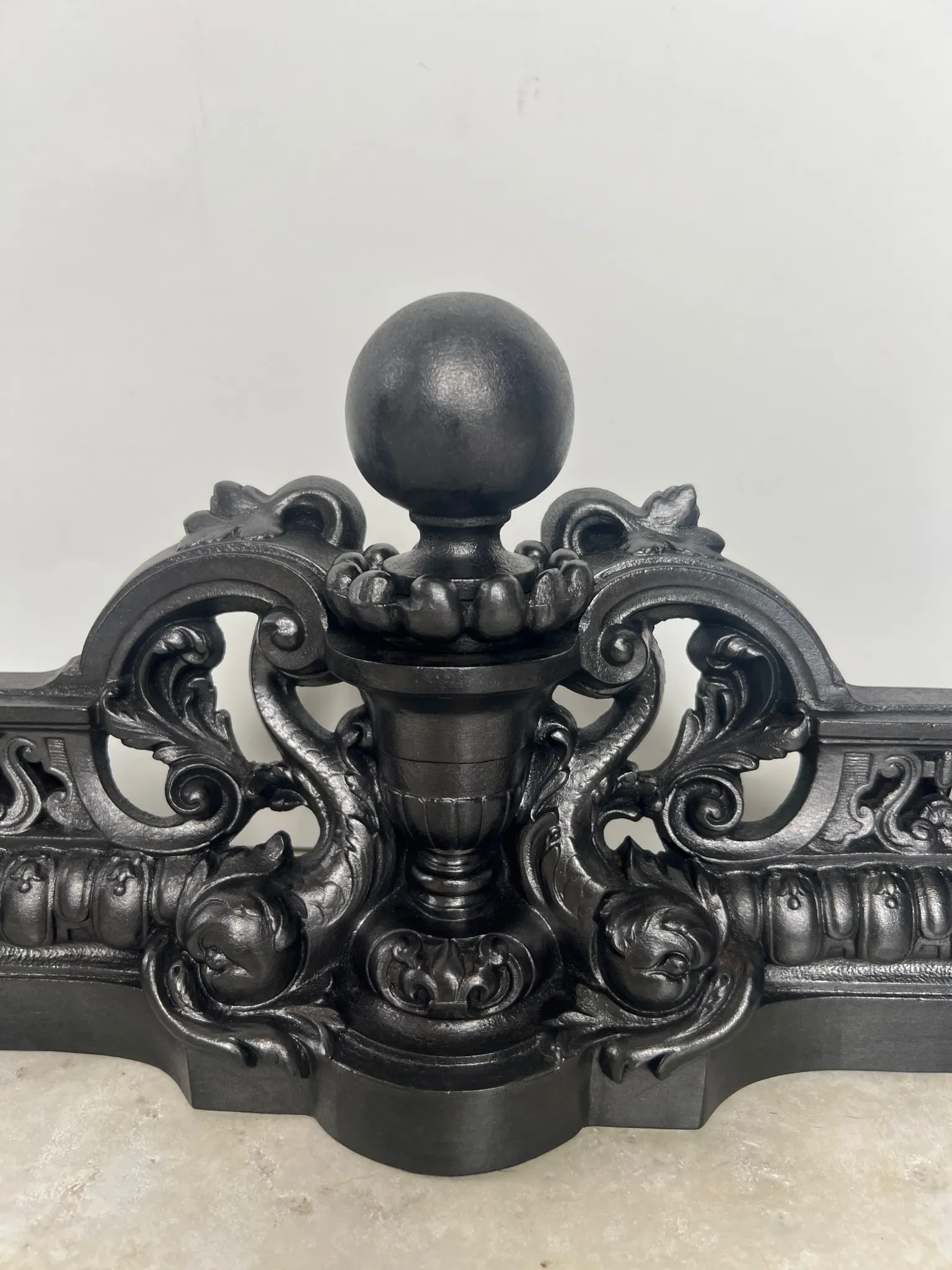 19th-century cast iron fireplace set, bar, andirons & plaque with griffins