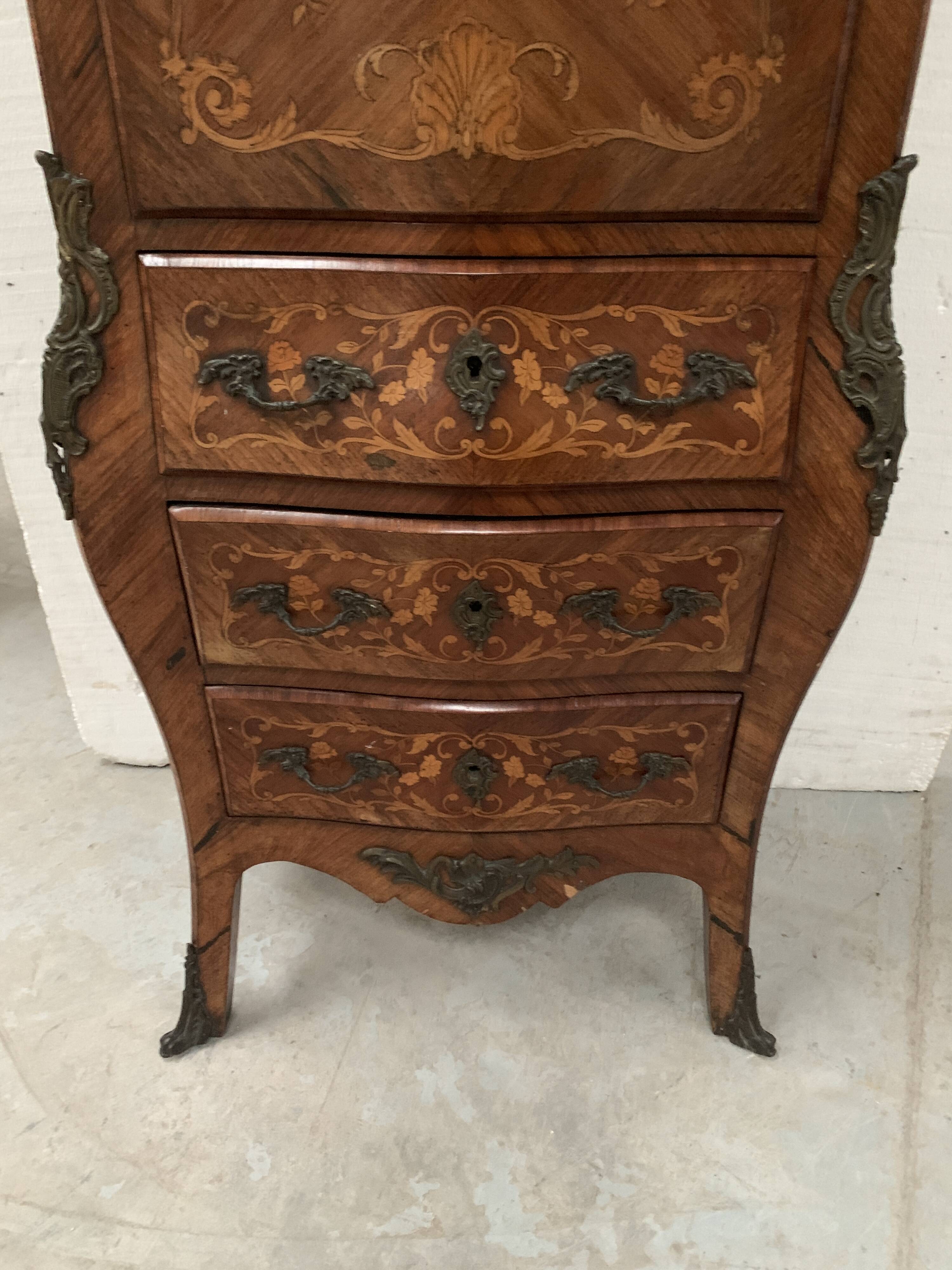 Louis XV style lady's secretary in light wood marquetry, 20th century.