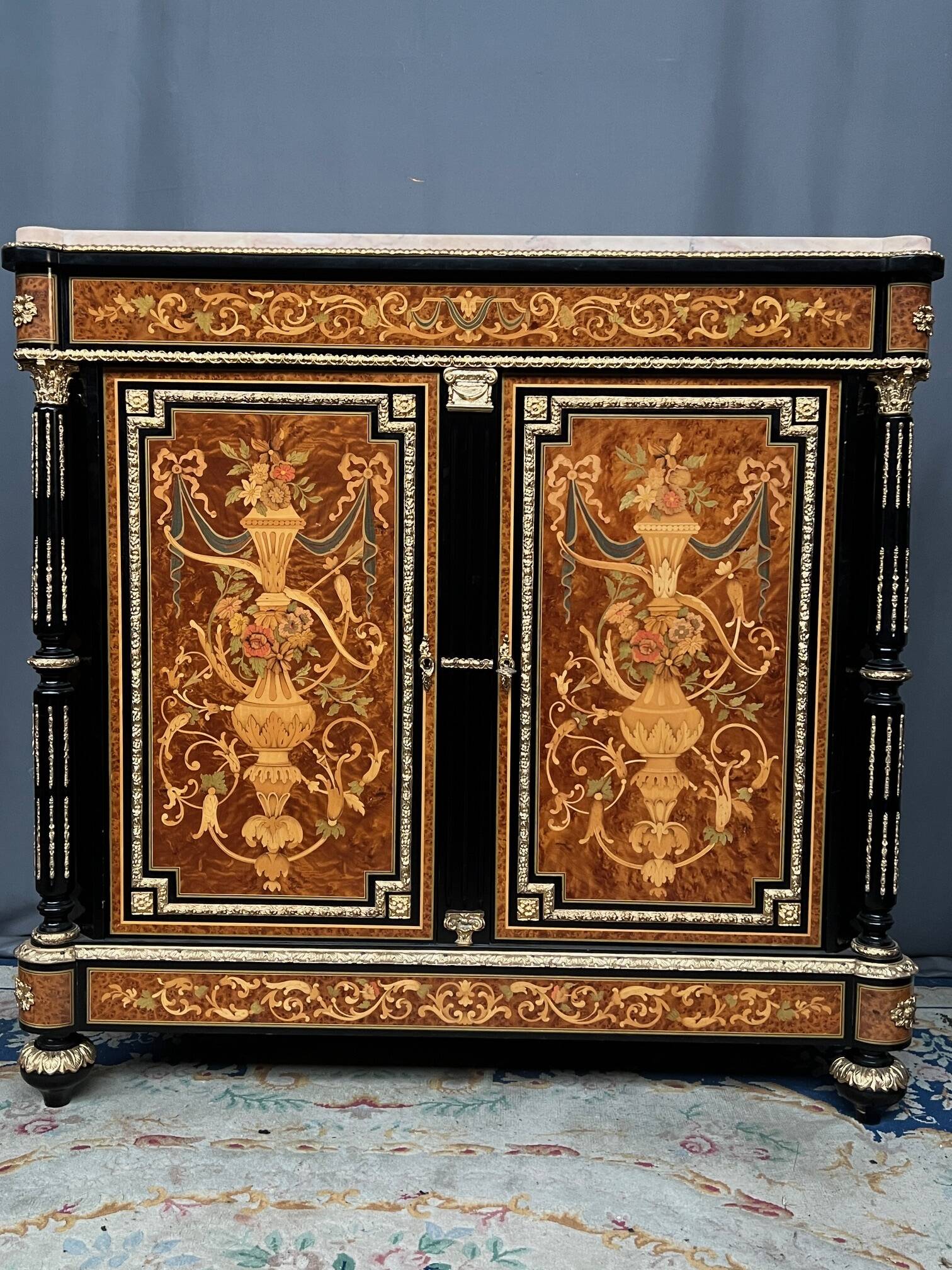 Two-door commode in Louis XVI style with marquetry and marble top.