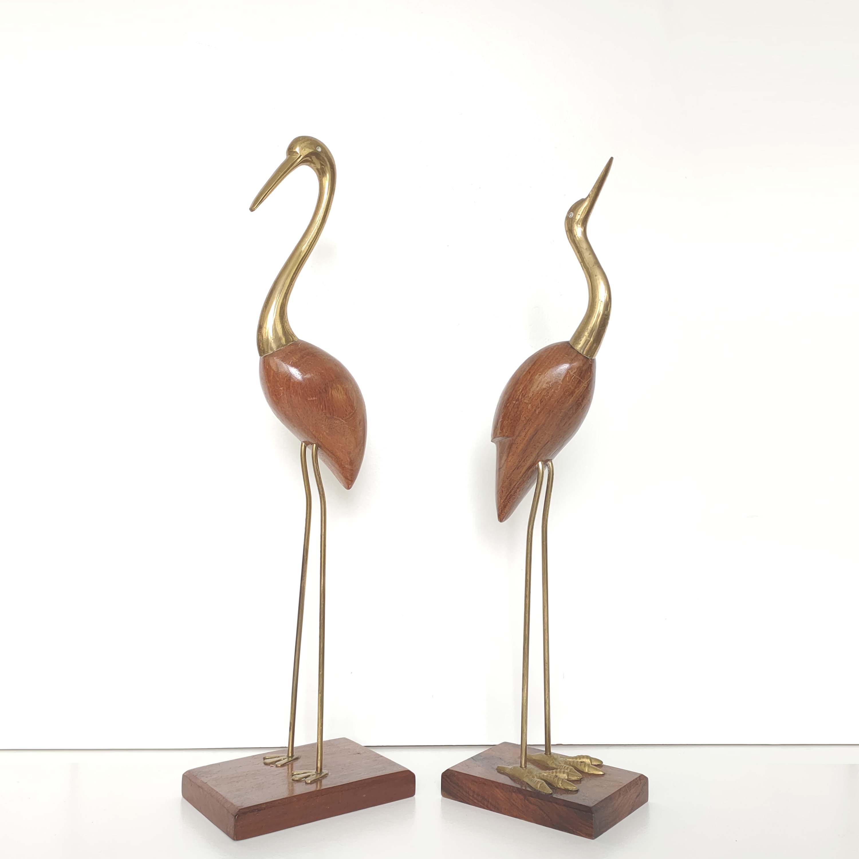 Couple blue herons and wood