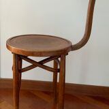 Wooden bistro chair, atypical backrest with pyrogravure on the seat.